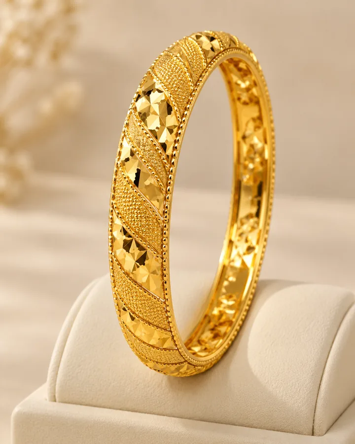 Diamond cut panel bangle, gold bangle at Sonei Jewellers Surrey