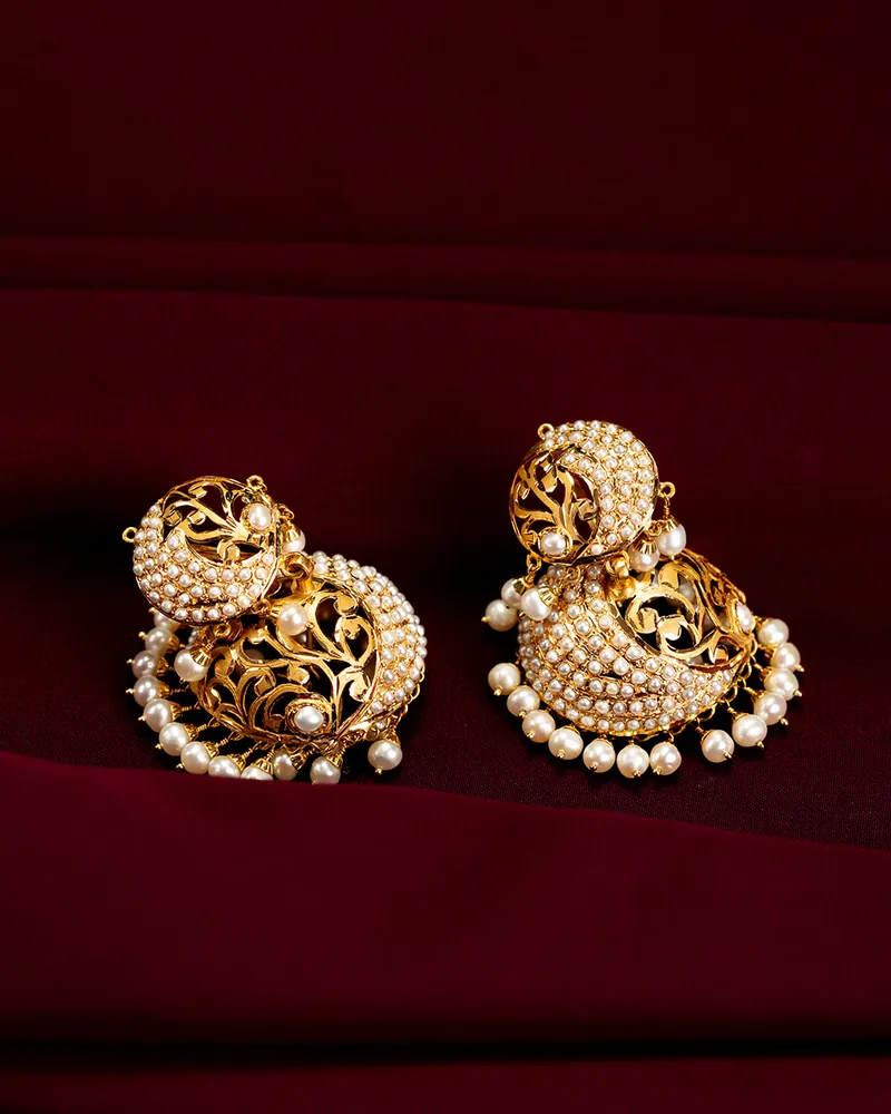 Pearl crescent earrings, kundan and pearl jewellery piece at Sonei Jewellers Surrey